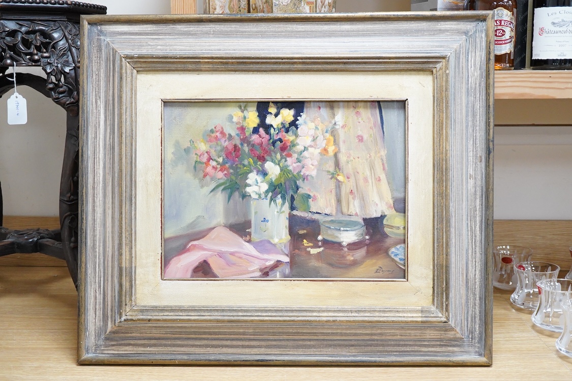 Elizabeth Parsons (b.1953), Still life of flowers on a dressing table, signed, oil on canvas, 28 x 38cm